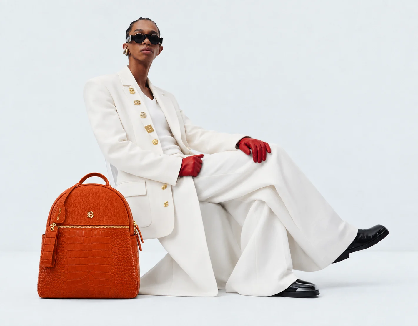 Sextillion orange leather backpack